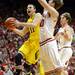 Michigan freshman Nik Stauskas looks to shoot around Indiana sophomore Cody Zeller in the first half at Assembly Hall on Saturday, Feb. 2 in Bloomington, Ind. Melanie Maxwell I AnnArbor.com